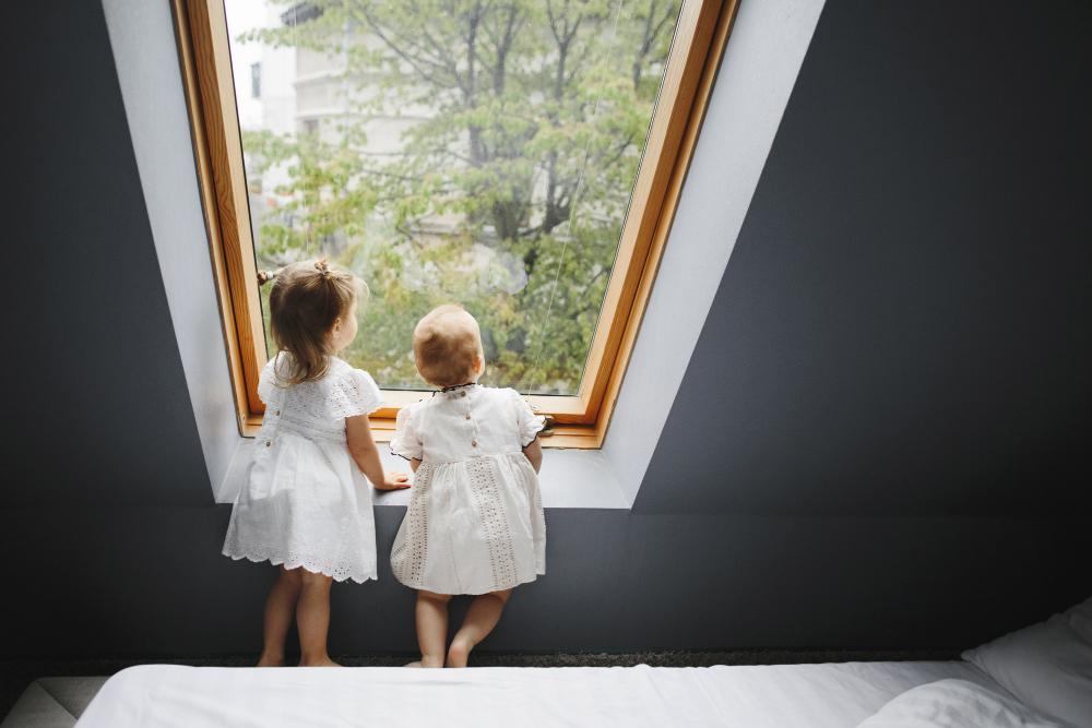 little-girls-looking-out-window image Augusta Road Window & Siding Specialists